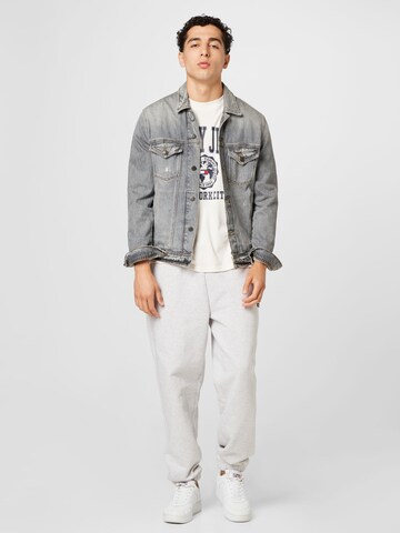 Tommy Jeans Tapered Παντελόνι 'Badge' σε γκρι