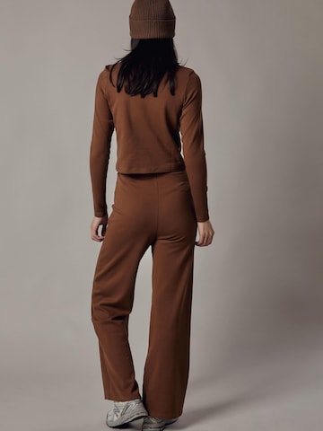 Flared Pantaloni 'Panta Palazzo in Interlock' di OWN Off With Nature in marrone