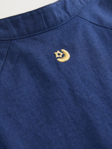 Next - Pijama entero/body en azul