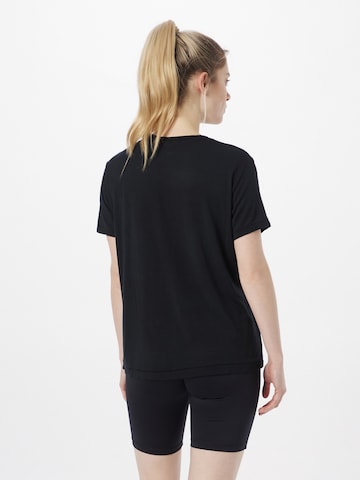Hurley Toiminnallinen paita 'PARADISE' värissä musta