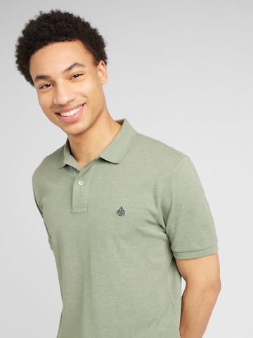 Springfield Poloshirt 'RECONSIDER' in Grün