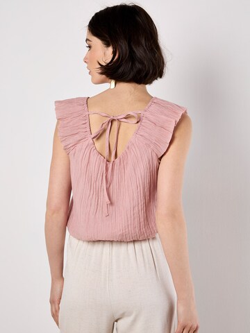 Haut Apricot en rose