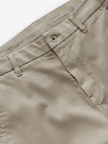 Slimfit Pantaloni chino di Next in beige