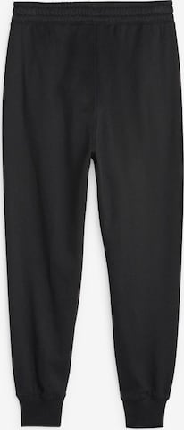 Tapered Pantaloni sportivi 'Train Favorite' di PUMA in nero