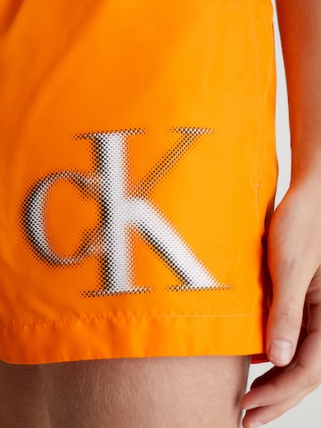 Calvin Klein Swimwear Ujumispüksid, värv oranž