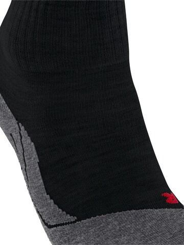 FALKE Sportsocken 'TK2 Explore Short'‌‌‌‌‌‌‌‌‌ in Schwarz
