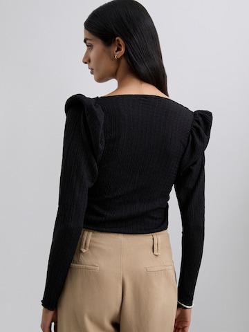 Scalpers Trikå ' ' i svart