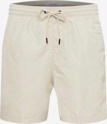 Shorts de bain Calvin Klein Swimwear en beige : devant