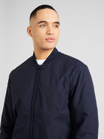 Champion Authentic Athletic Apparel Tussenjas 'Legacy' in Blauw
