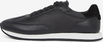 Baskets basses Calvin Klein en noir : devant