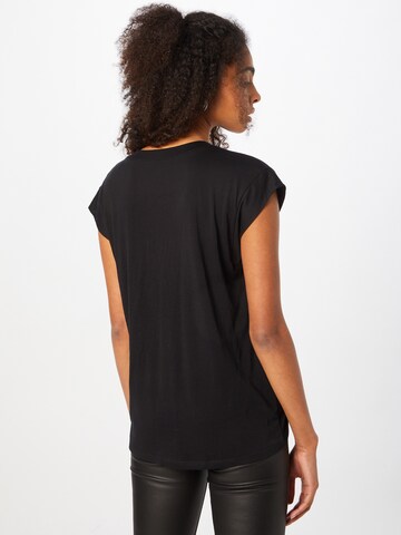 Tricou de la FRAME pe negru