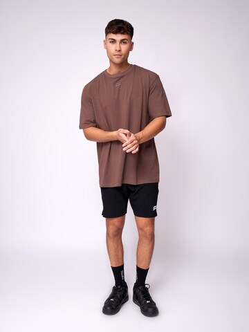 Maglietta 'Essential Oversized T-shirt' di Fortex Fitness in marrone