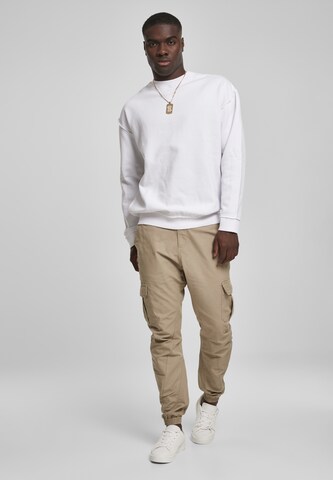 Urban Classics Tapered Cargo trousers in Beige