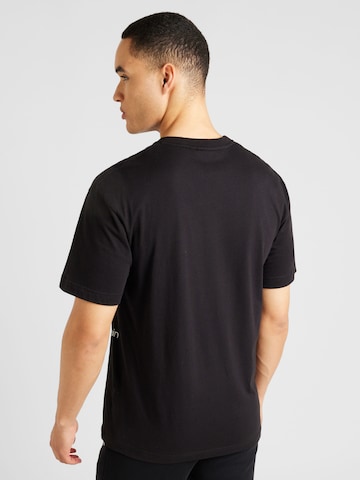 Tricou 'OFF PLACEMENT' de la Calvin Klein pe negru