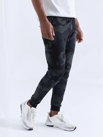 Tommy Life - Skinny Calças de desporto 'Jogginghose' em cinzento