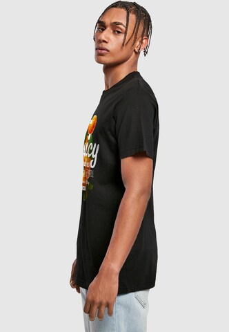 T-Shirt 'Delicious Peaches' Mister Tee en noir