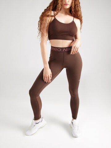 Skinny Pantalon de sport 'Pro' NIKE en marron