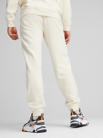 PUMA Tapered Sports trousers in Beige