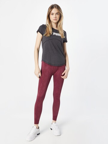 PUMA Skinny Sportbroek in Lila