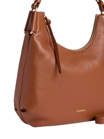 Coccinelle Handtasche 'COCCINELLE REBEKKA 3' in Braun