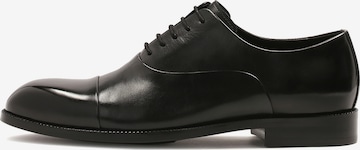 Scarpa stringata di Kazar in nero: frontale