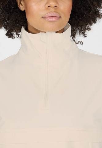 Athlecia Performance shirt 'Carley' in Beige