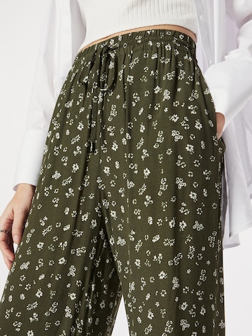 ABOUT YOU Loose fit Pants 'Letizia' in Green