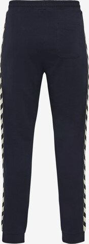 Effilé Pantalon de sport 'Move' Hummel en bleu