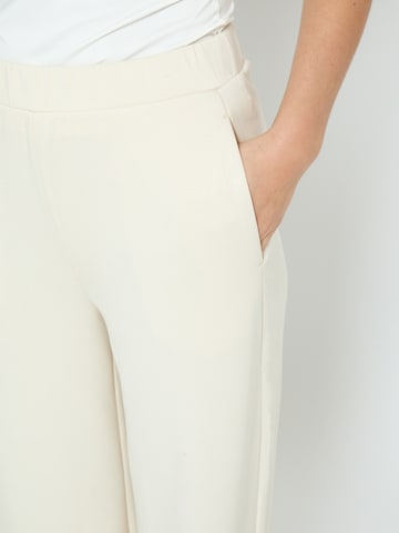 Wide leg Pantaloni 'Minnie' di Peppercorn in beige