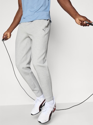 PUMA Конический (Tapered) Спортивные штаны 'Cloudspun' в Серый