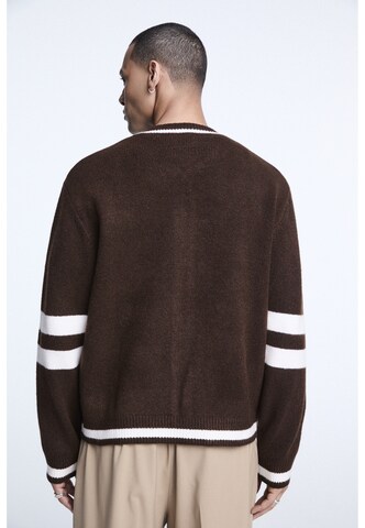 Vestes en maille Karl Kani en marron