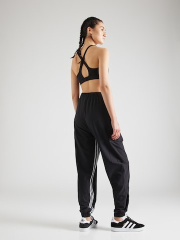 Effilé Pantalon de sport 'Dance All-gender Versatile Woven Cargo Bottoms' ADIDAS SPORTSWEAR en noir