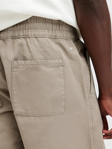 AllSaints Loosefit Kalhoty 'HANBURY' – béžová