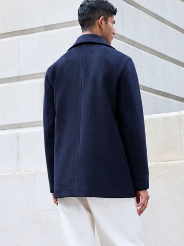 Next Övergångskappa i blå