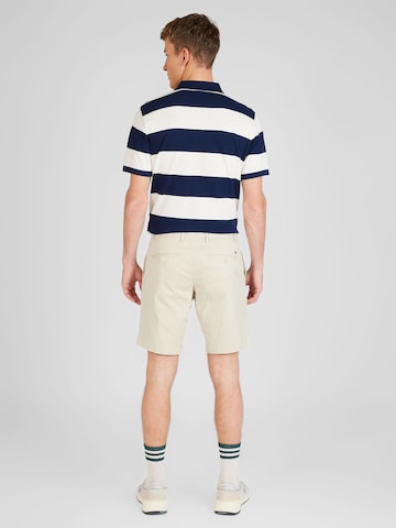 smėlio TOMMY HILFIGER Standartinis „Chino“ stiliaus kelnės 'Brooklyn 1985'