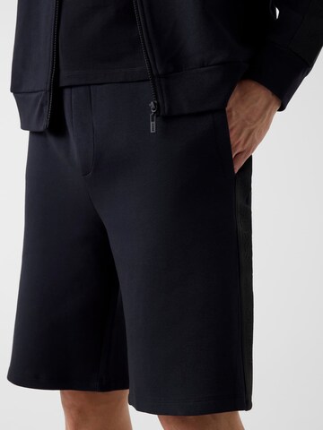 GUESS Loose fit Pants in Black