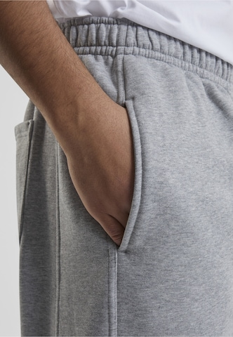 Loosefit Pantalon Urban Classics en gris