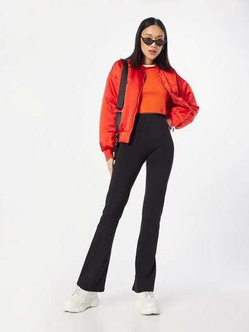 Evazați Pantaloni 'Jazz' de la Champion Authentic Athletic Apparel pe negru