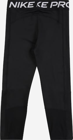 Skinny Pantaloni sportivi di NIKE in nero