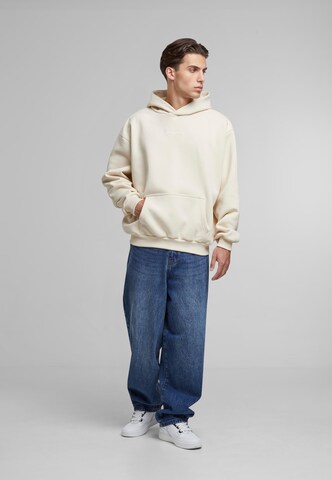 Karl Kani Collegepaita värissä beige