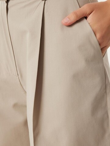 Happiness İstanbul Wide leg Pleat-front trousers in Beige