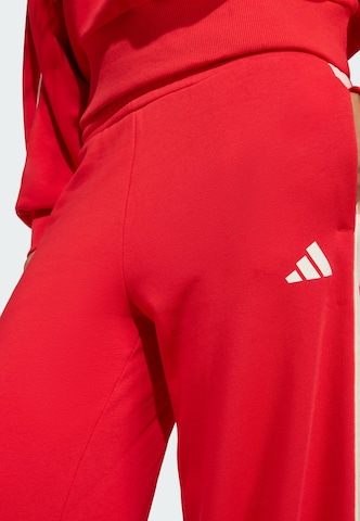 ADIDAS SPORTSWEAR - Pierna ancha Pantalón deportivo 'Stadium' en rojo