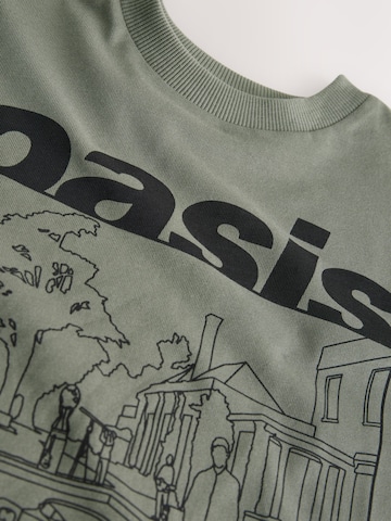 Tricou de la Next pe verde