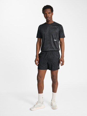 Regular Pantalon de sport Hummel en noir