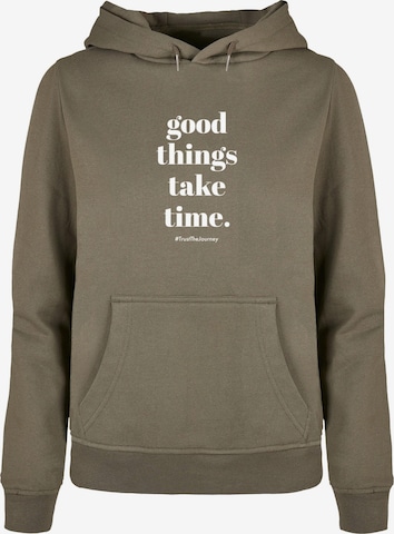 Merchcode Sweatshirt 'Good Things Take Time' in Grün: predná strana