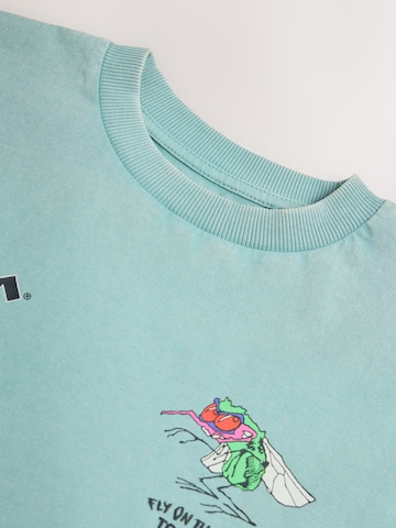 Next T-Shirt in Grün