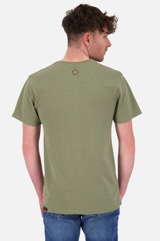 Tricou 'NicAK' de la Alife and Kickin pe verde