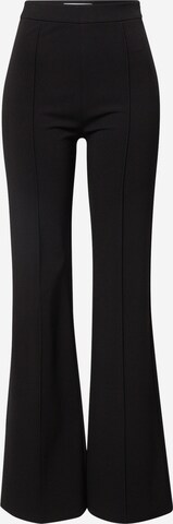 florence by mills exclusive for ABOUT YOU Flared Trousers 'Spruce' in Black: front