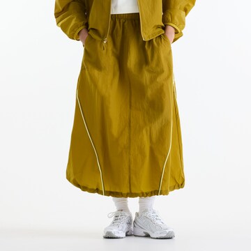 Jupe 'Sport Legacy Skirt' new balance en jaune : devant
