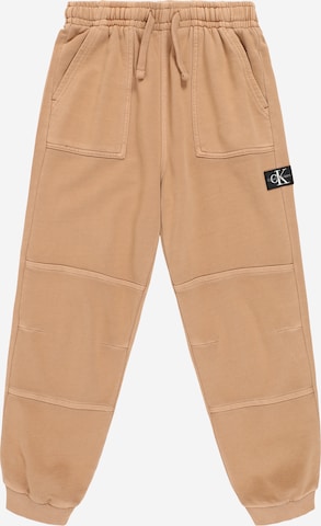 Calvin Klein Jeans Zúžený Kalhoty – oranžová: přední strana